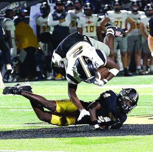 packer football vs. Richmond Hill