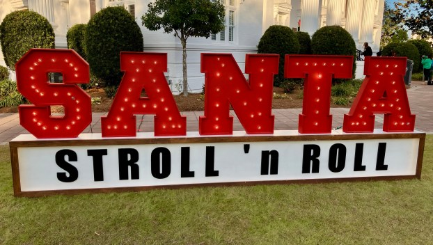 santa stroll and roll sign