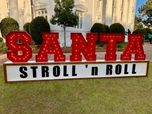 santa stroll and roll sign