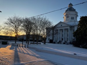 sun and snow over courthouse