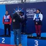 Hughes receives medal at Special Olympics