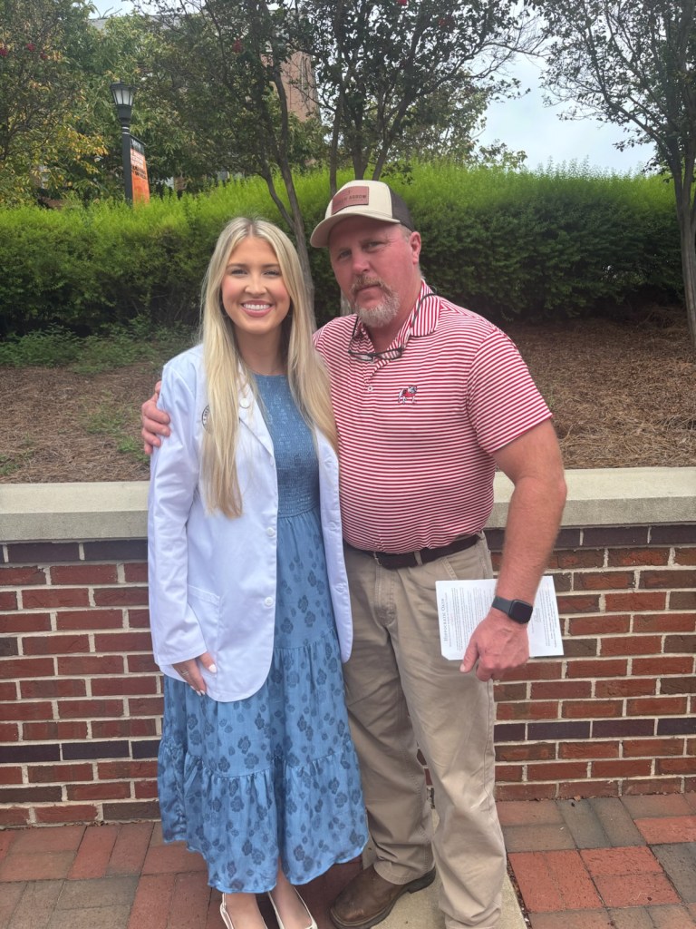 Hood receives white coat